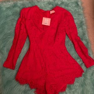 Red lace play suit.